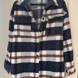 Oversized navy, brown, and white plaid flannel shacket.